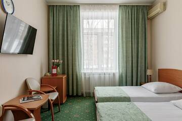 Двухместный номер с 2 отдельными кроватями в Гостинице Максима Ирбис